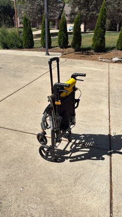 Compact folding wheel chair