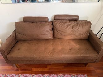 Faux sued couch