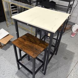 Table And Stools 