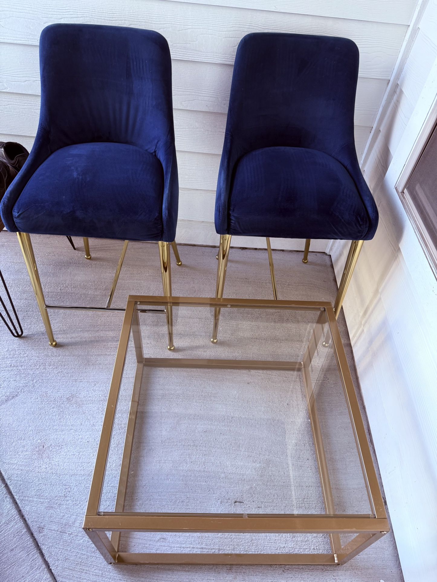 Blue Velvet upholstered stool chairs & Glass Gold coffee table
