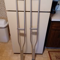  Crutches , Like New,  5.10x6.6 Ft.