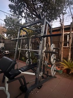 OLYMPIC SMITH MACHINE SQUAT RACK WITH OLYMPIC WEIGHTS AND BENCH