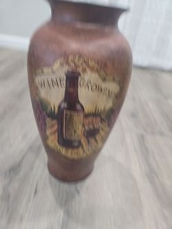 Decrotive vase with wine theme