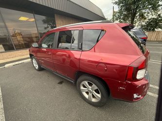 Jeep Compass SUV – Red with Rear Damage