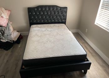 Queen size bed frame with mattress