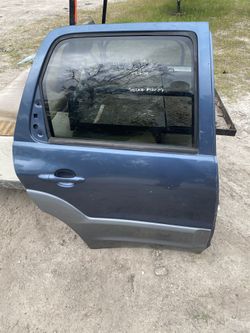 2001 MAZDA TRIBUTE OEM DOOR !