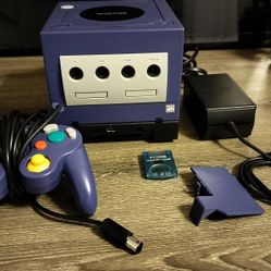 GameCube with Gameboy adapter and disc
