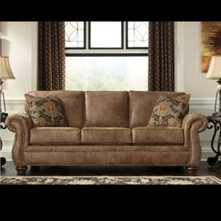 89"W, Larkinhurst, Sleeper Sofa in Brown Faux Leather, QUEEN Size.