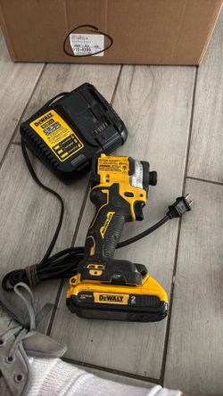 Dewalt impact drill w/ battery and charger.