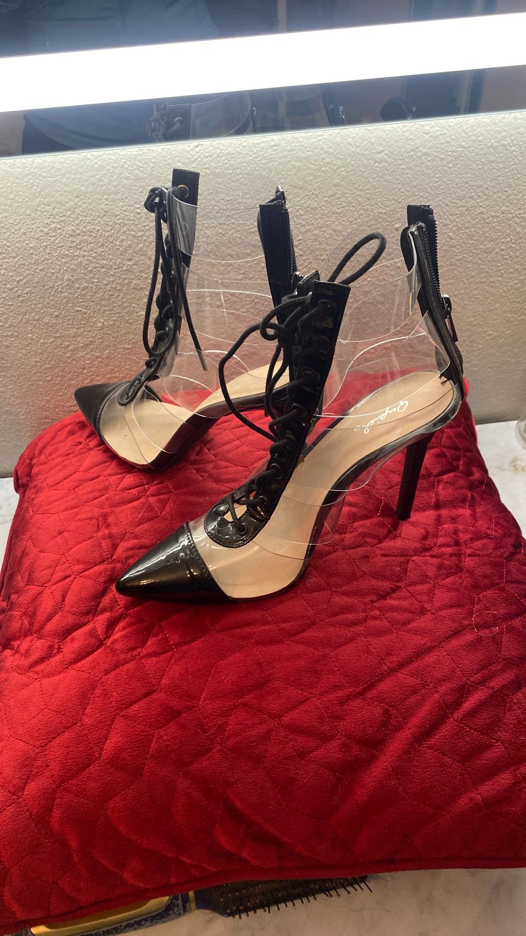 Woman’s Black And Clear, High Heels