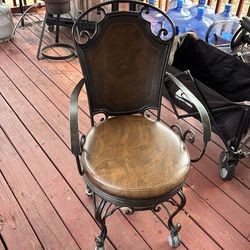 Rod iron swivel chair
