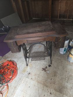 Antique treadle sewing cabinet
