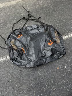 SanHima waterproof car roof bag, soft-shell cargo carrier designed for road trips and camping.