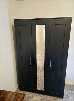 BRIMNES wardrobe with 3 doors and a center mirror
