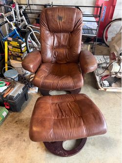 Leather recliner chair with foot rest