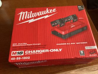 Milwaukee M18 18-Volt Lithium-lon Dual Bay Rapid Battery Charger.  Brand NEW.   NUEVO.
