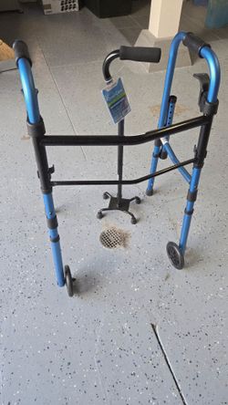 Walgreens folding walker and cane.