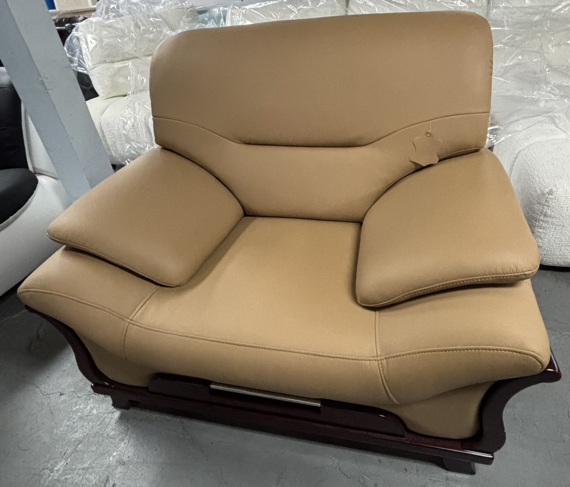Elegant Brown Leather Armchair with Wood Base