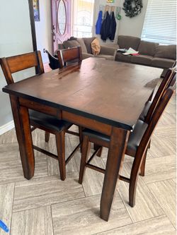 Table & 4 chairs used good condition.