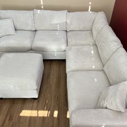 New Corduroy Fabric Sectional.  Off White / Beige.  990 X 99”.  Free Delivery!