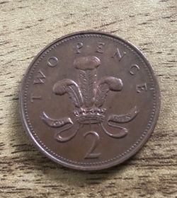 Four United Kingdom coins both sides