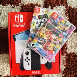 Nintendo Switch OLED With Mario Party And Mario Kart 8