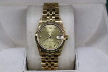 Ladies midsize 18k yellow gold Rolex datejust 68278