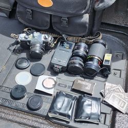 Pentax Asahi Me Camera bundle have extra lens carry case wips different lens cover 
