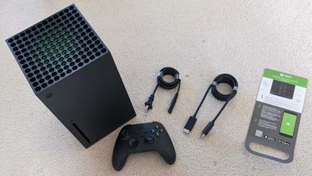 Microsoft Xbox x with box and 2 controllers