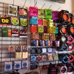 Good Assortment Of Strings Pics Capos Cables And More