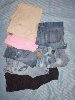 *8 Pairs of Woman's (Name Brand) shorts*