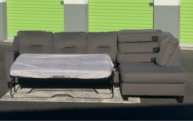 Free Delivery, Excellent Condition | Dark Gray 2-Piece Sleeper Sectional |