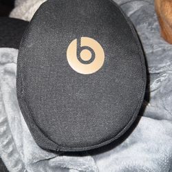 Gold wireless Beats Headphones