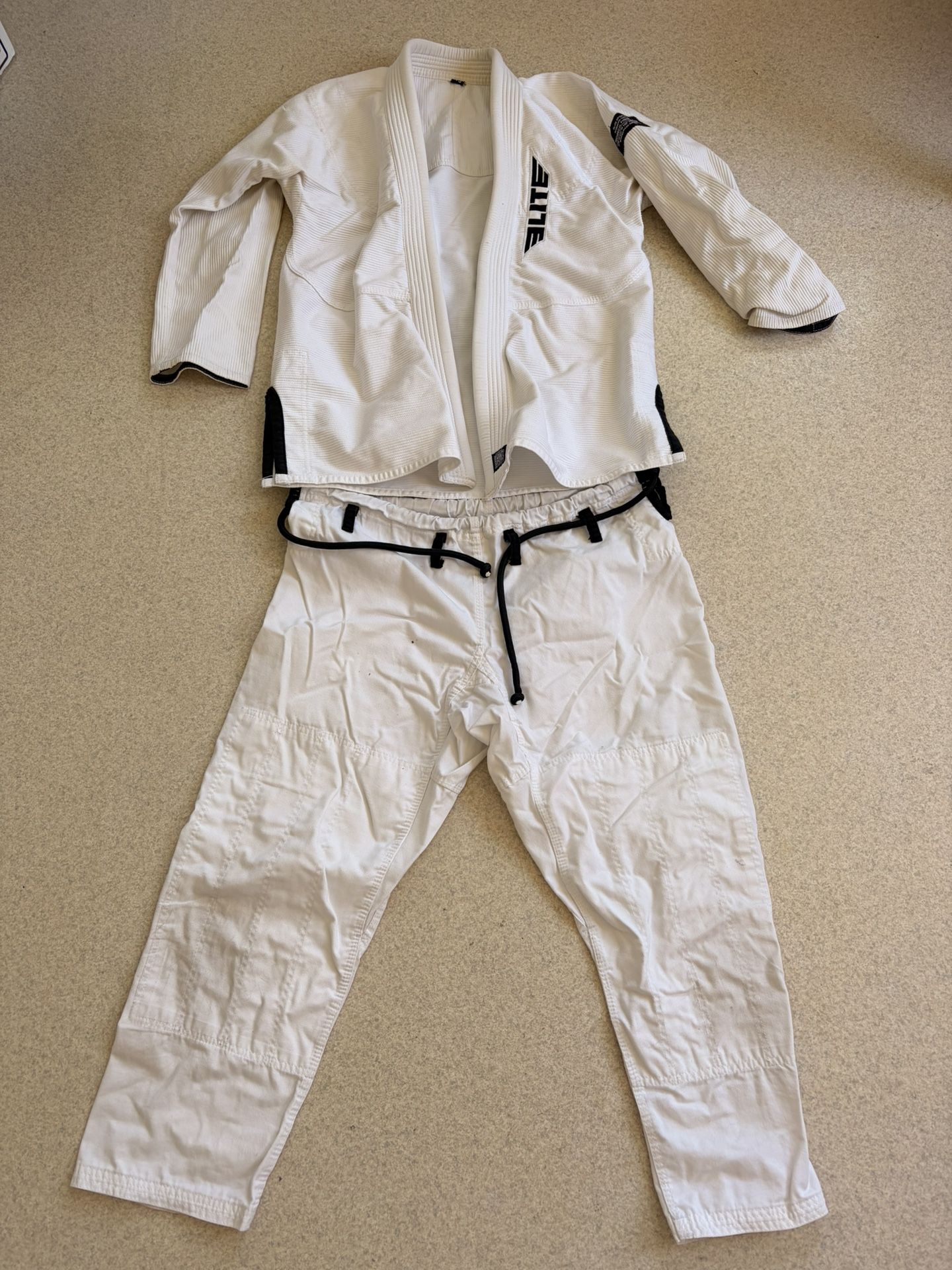 Martial Arts Uniforms Plus 2 White Belts