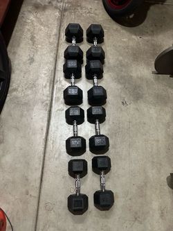 Rubber Dumbbells like new  $1/lb