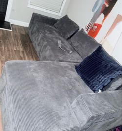 Grey Corduroy Couch and chase