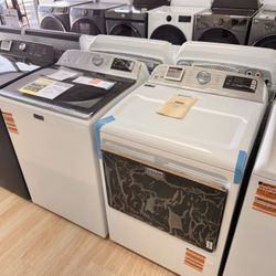 Brand-new Maytag laundry set 4.7 cu. ft. top-load washer and 7.4 Front load gas dryer. 5 YEAR WARRANTY 