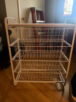 Storage with the wire basket pull out drawers