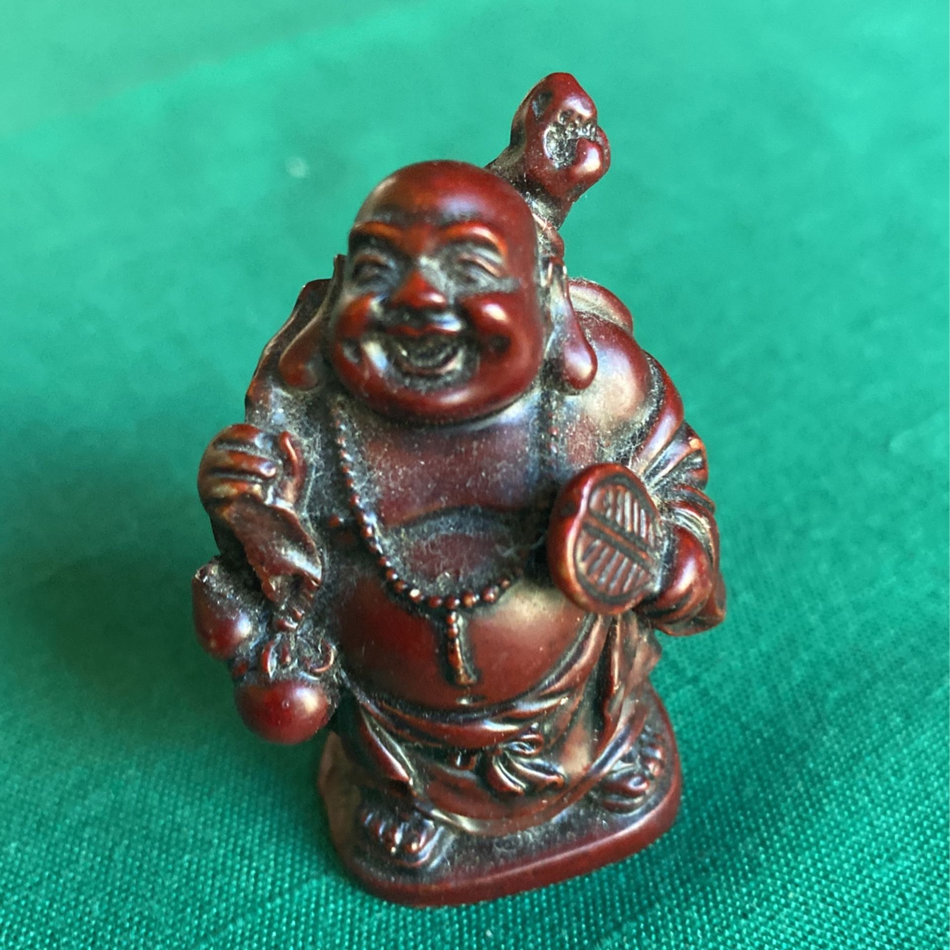 Vintage collectible red 2 inch tall happy Buddha statue