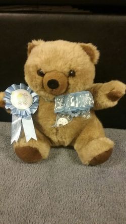 Heartbeat teddy bear with "it's a boy" ribbon and pin.