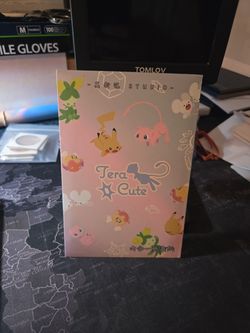 The Tera Cute Lens art board is a sealed non-TCG Blind Board