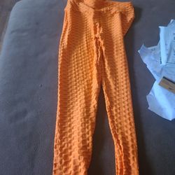 Women Orange tic toc pants size L