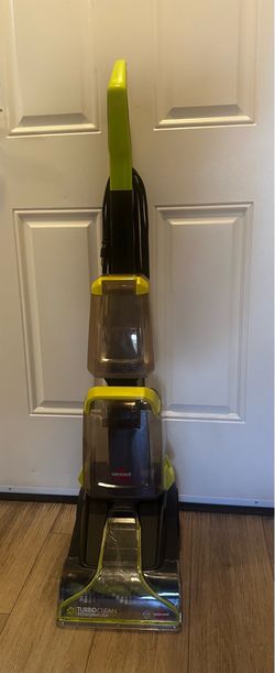 Vacuum carpet cleaner