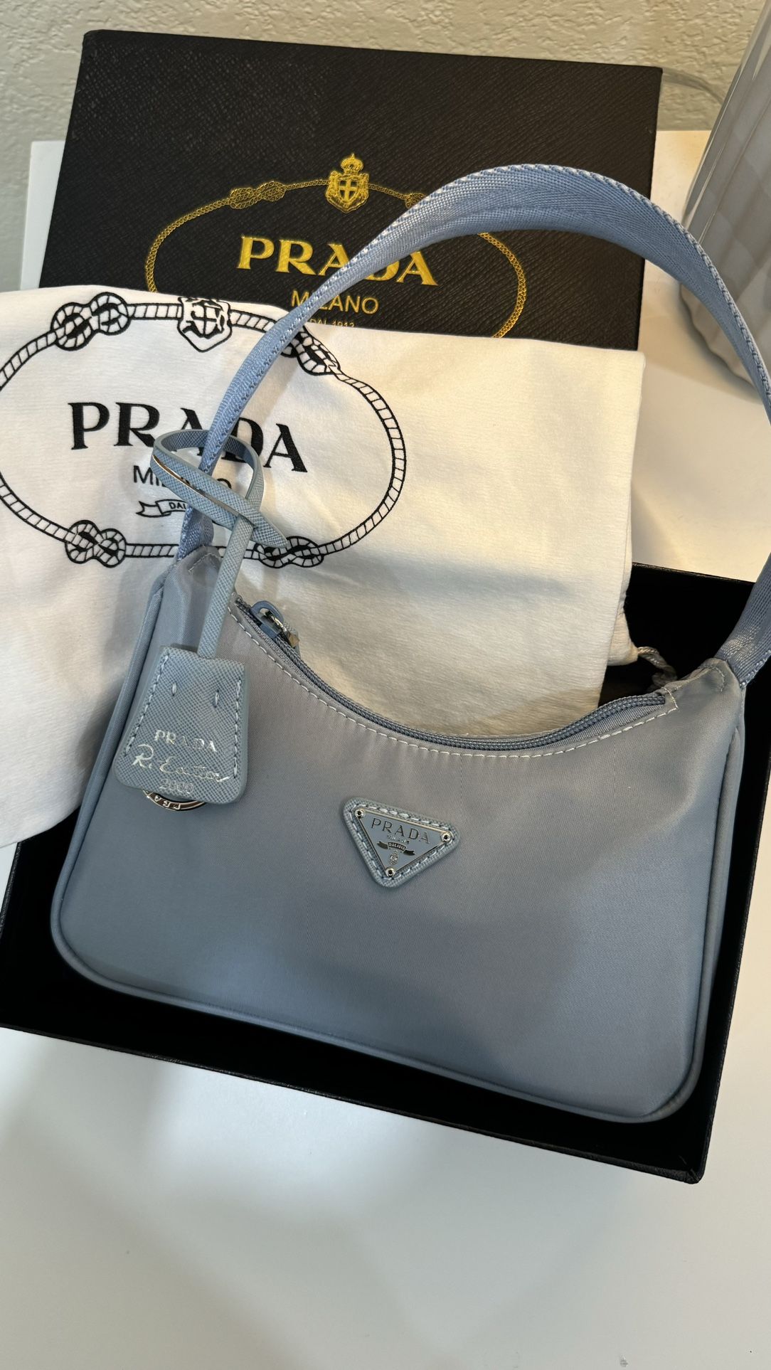 Re-edition baby Blue Prada Bag