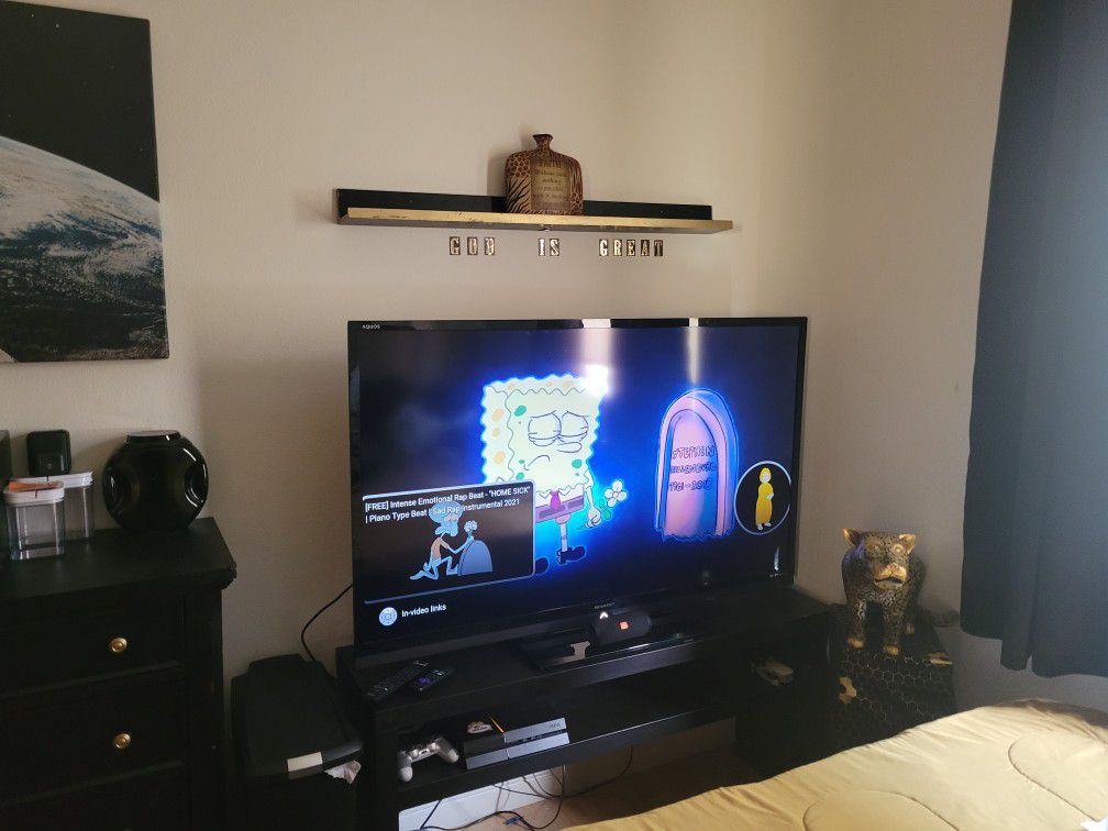 65" Sharp  Smart Tv With Tv Stand And Ps4 With 16 Games And Controllers