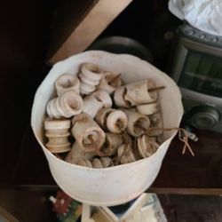 Container full of old insulators make me an offer