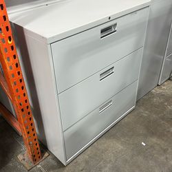 3 drawer Hon Metal Lateral File cabinets in light gray color with keys