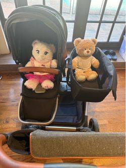 Twin contour stroller