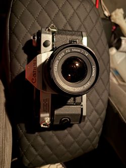 Canon AE-1 Program 35mm Film Camera with 50mm f/1.8 Lens