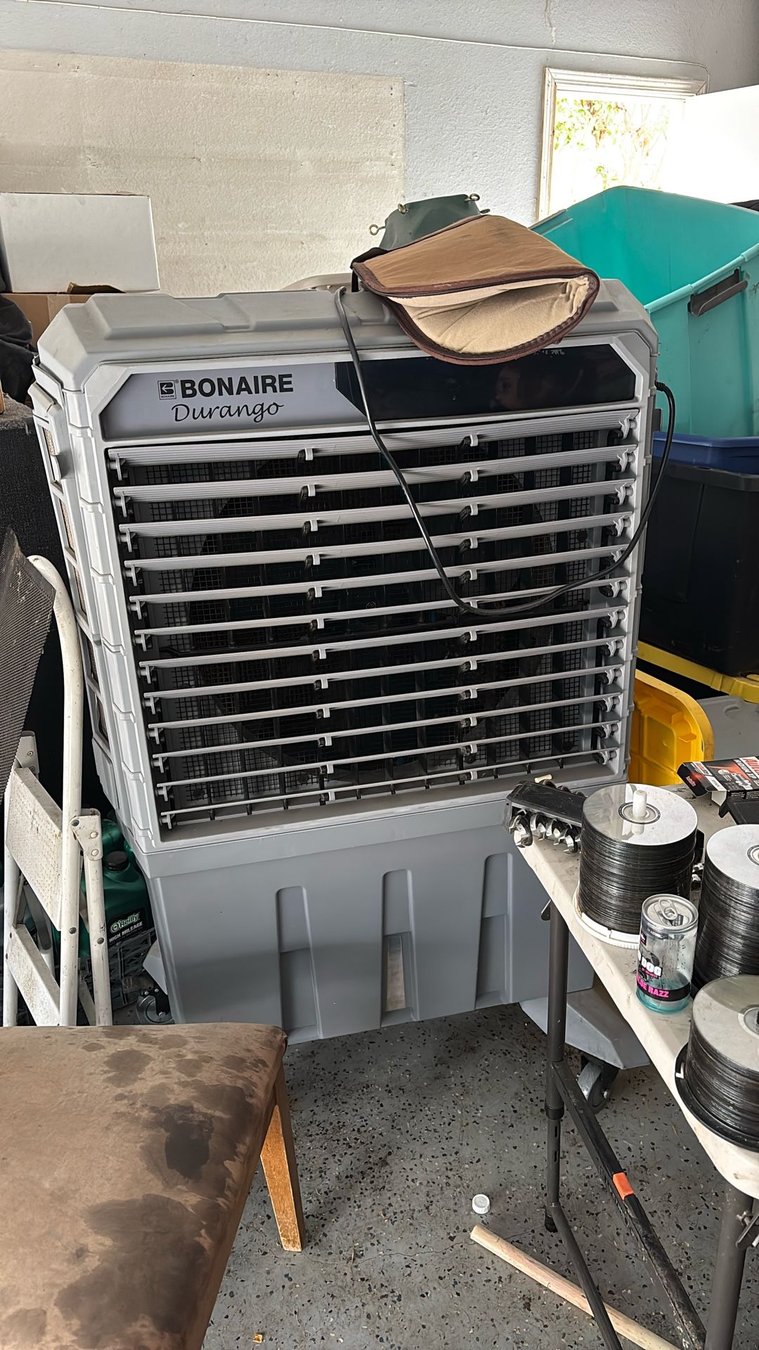 Swamp cooler or evaporated cooler works great